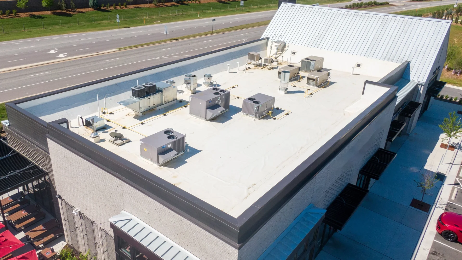 Modern low-slope commercial building roof in the Dallas–Fort Worth area